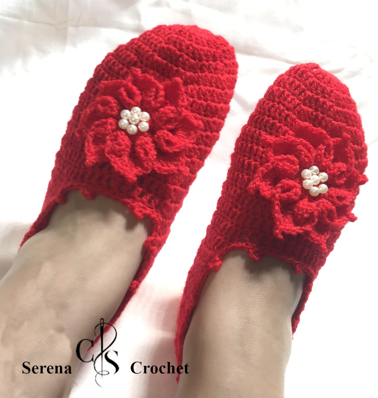 Chaussons rouge fleur à huit pétales au crochet